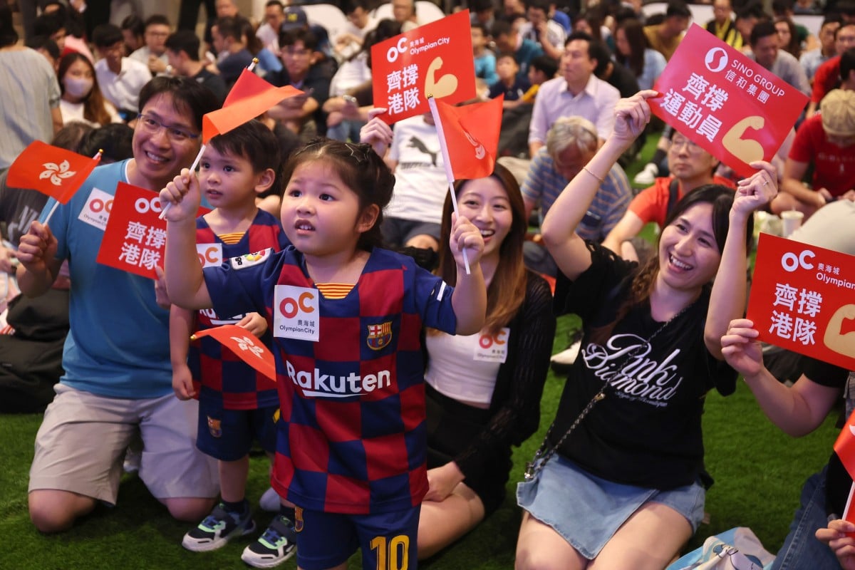 Supporters watch a broadcast of Hong Kong’s semi-final football match against Japan in the Asian Games, at Olympian City in Kowloon on October 4. Photo: Edmond So