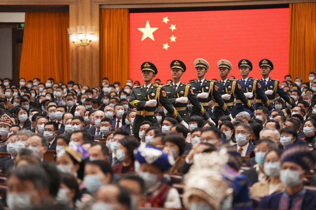 The People’s Liberation Army guard of honour march during the ceremony for newly elected Chinese leaders to pledge allegiance to the country’s constitution, at the Great Hall of the People in Beijing, on March 10. Photo: Xinhua