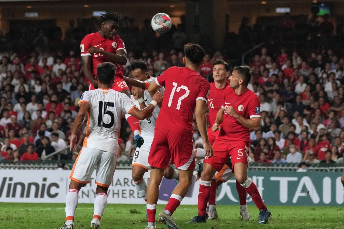 Hong Kong striker Michael Udebuluzor rises highest to head his side in front during their World Cup qualifying game against Bhutan at Hong Kong Stadium. Photo: Elson Li
