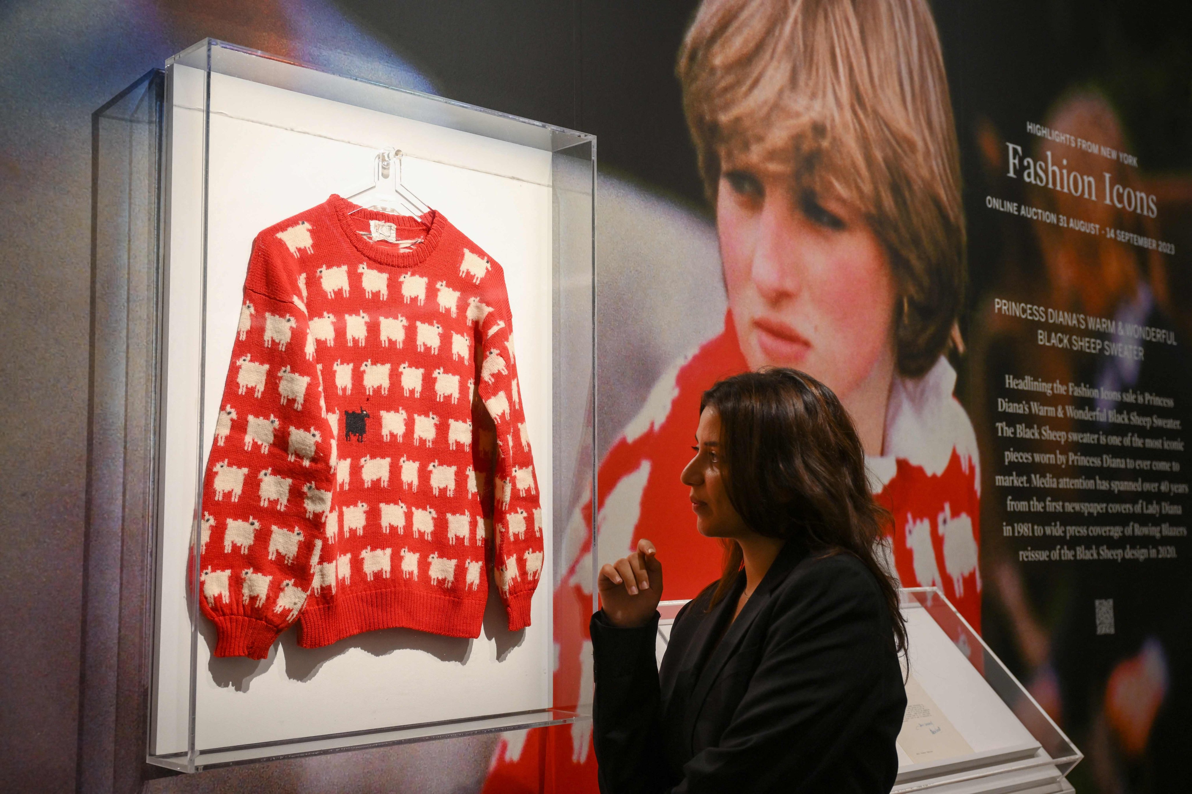 Princess Diana’s black sheep jumper on display at Sotheby’s auction house on July 17 ahead of its sale. Photo: AFP
