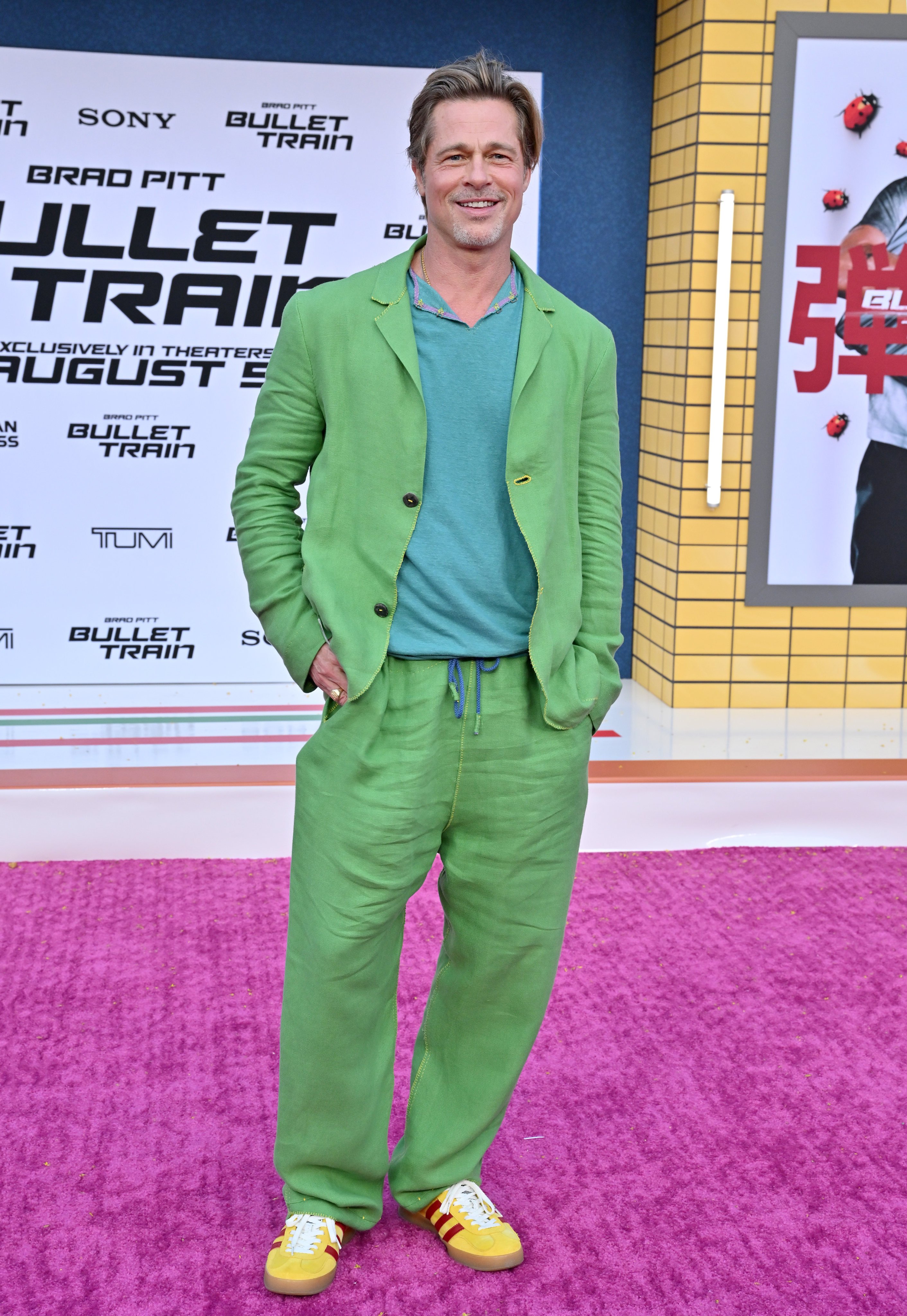 Brad Pitt’s young, colourful look, worn for a 2022 premiere of his film Bullet Train, set tongues wagging about who might have inspired his new, fresher style. Photo: FilmMagic