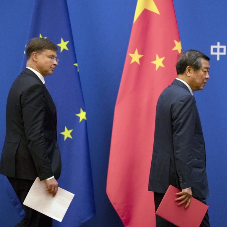 European Commission Executive Vice-President Valdis Dombrovskis and Chinese Vice-Premier He Lifeng arrive for a press conference following the 10th EU-China High-Level Economic and Trade Dialogue in Beijing on September 25. Photo: EPA-EFE